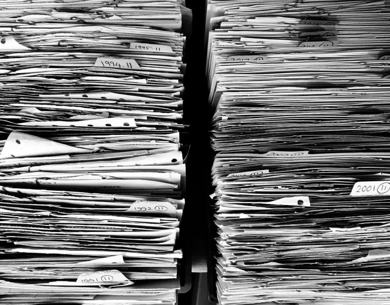 Files, paper, office — "Security Features and Benefits of PDF417 Barcodes for Driver's Licenses"
